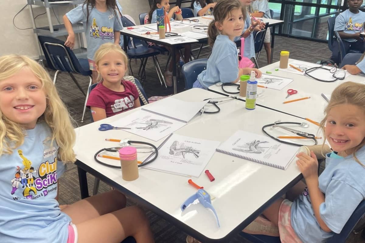 Girls around table at Club SciKidz Dallas