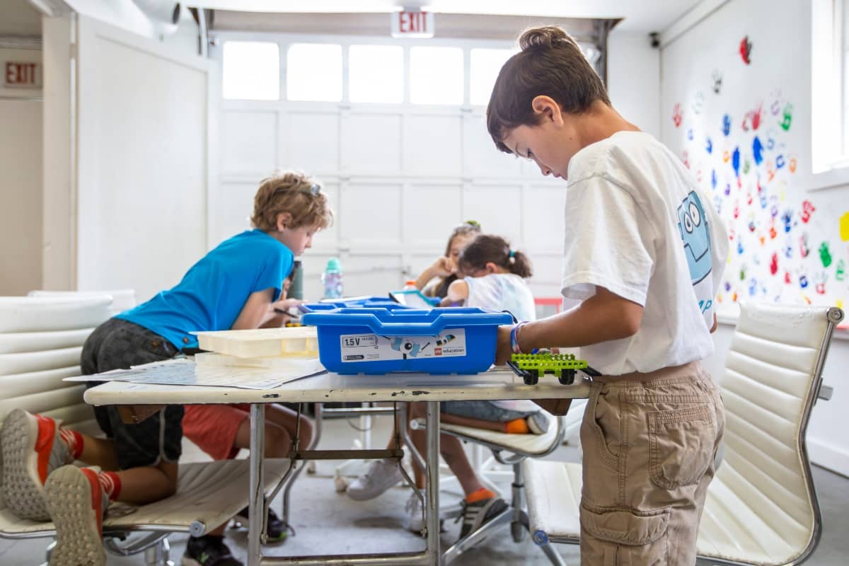 Campers doing STEM project at iCamp