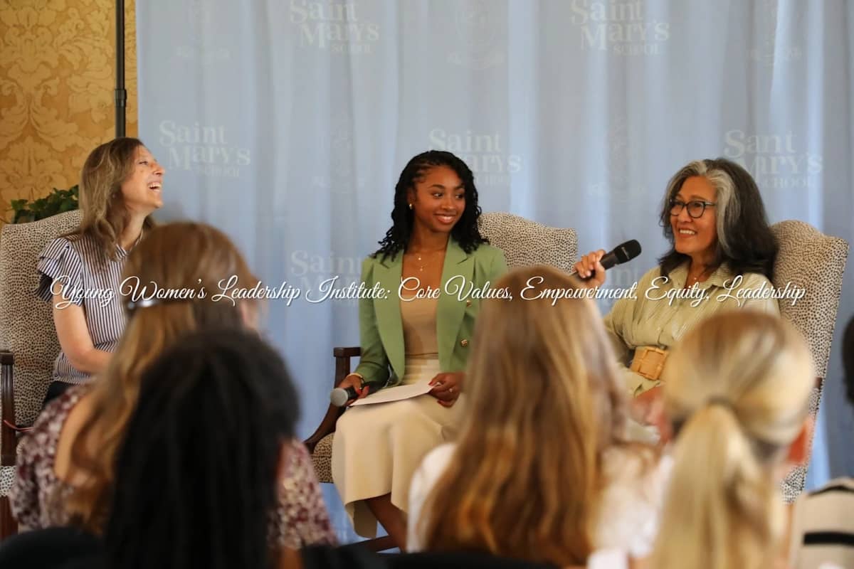Young women giving speech at the Young Women's Leadership Institute